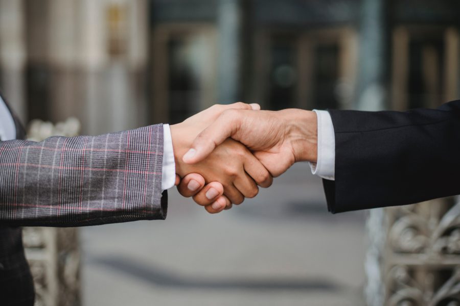 Handshake between two people.